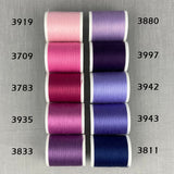 Spoler med Lana no. 12 broderitråd i lilla farver