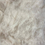 karteflor af bergschaf uld sand