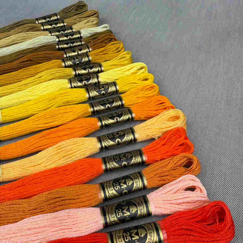 DMC Moulinégarn gyldne og orange farver