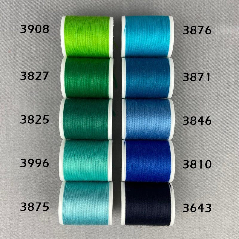 Lana no 12 broderitråd blå og grønne spoler 