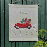 Gavebilen adventkalender fra Pomp Stitch - motivet er en bil fyldt med gaver og juetræet