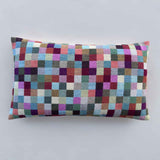 Baldyre puder med farverigt mønster med firkanter