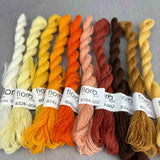 broderigarn i gule, orange og brune farver fra tekstilmagi