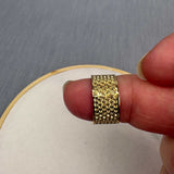 Tulip fingerbøl på finger